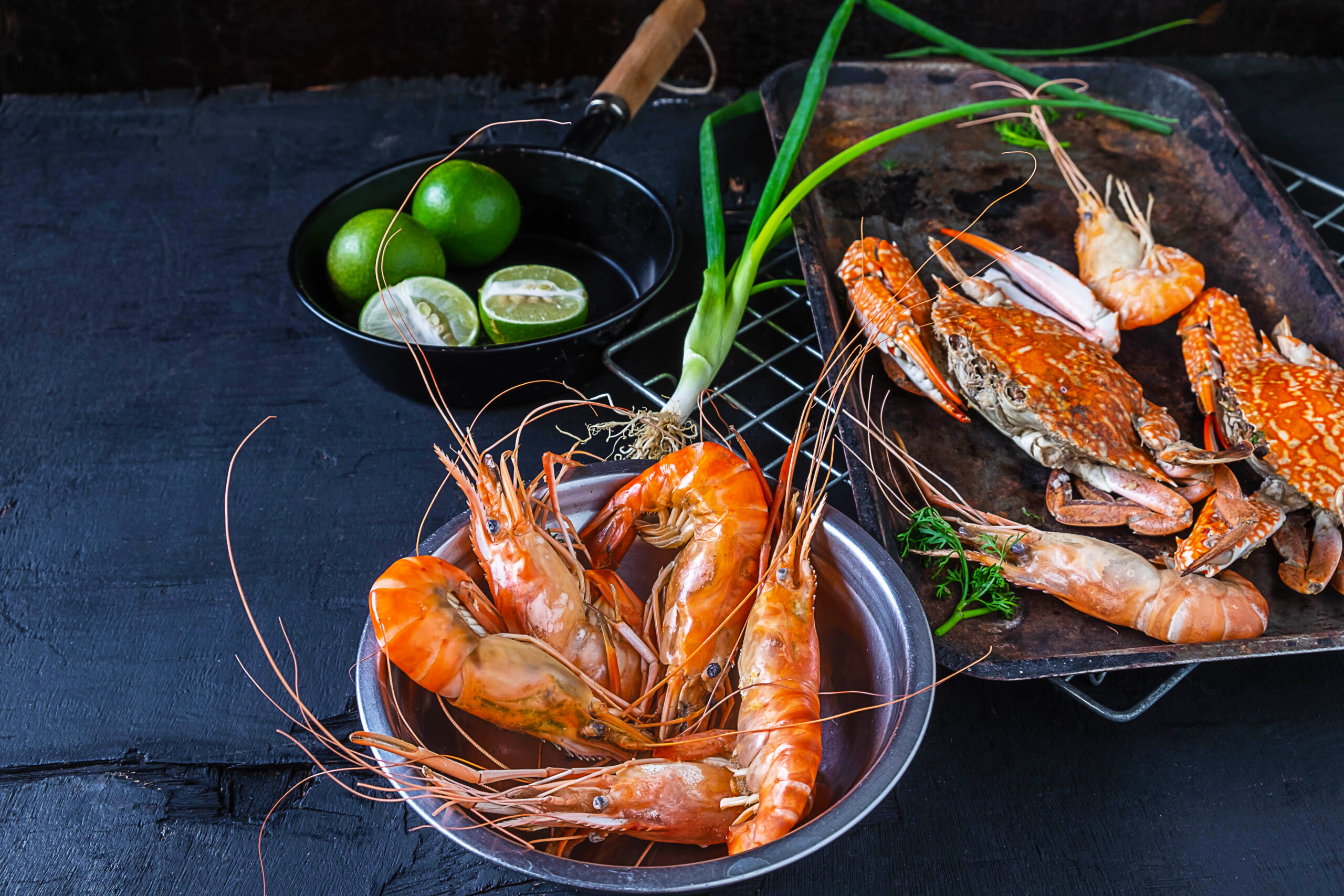 Cook seafood with shrimp and crab on the table.